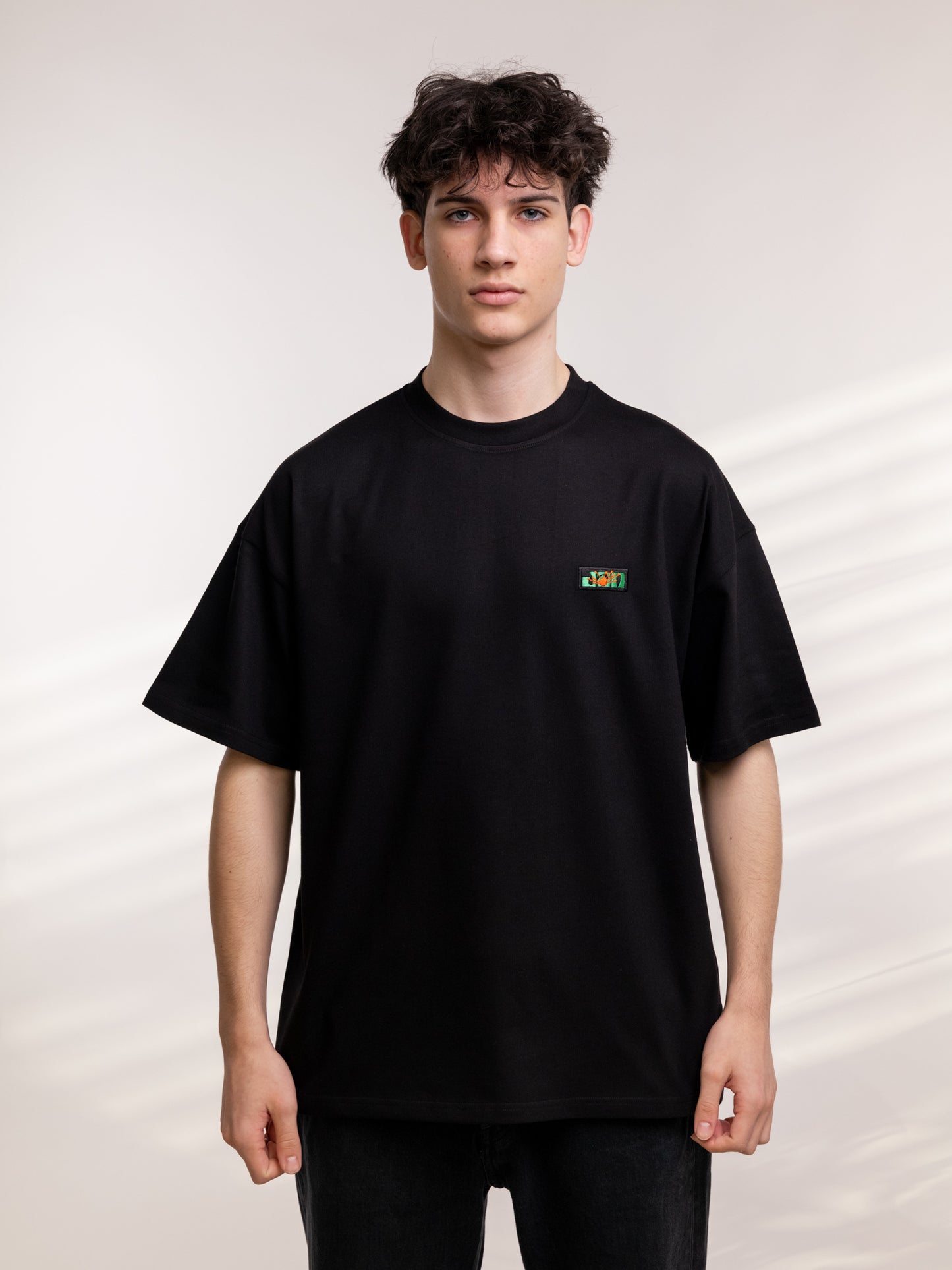 JAN SHOW 12 BLACK PATCH TEE